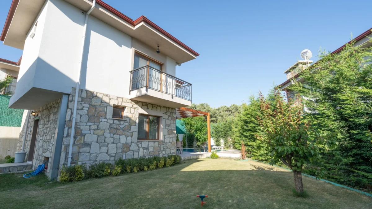 Villa surrounded by greenery in a private garden